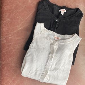 To cat and Jack cardigan sweaters. Black and white